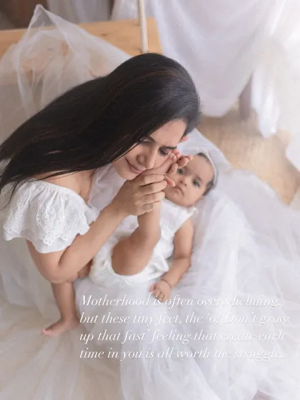 A mother's gentle touch. This image captures the overwhelming love and awe a parent feels for their child, a feeling I strive to capture in every session.