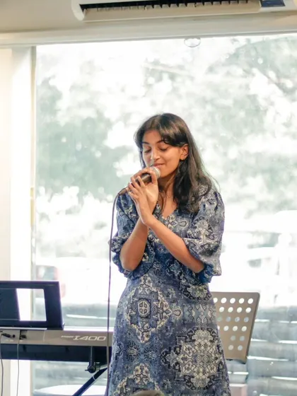 A student vocalist delivering a beautiful performance at our recital. The pride and sense of accomplishment after a successful performance is an amazing thing to see.