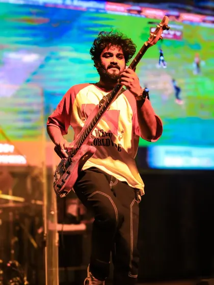 Another angle of our bassist, feeling the rhythm and driving the energy of the song.