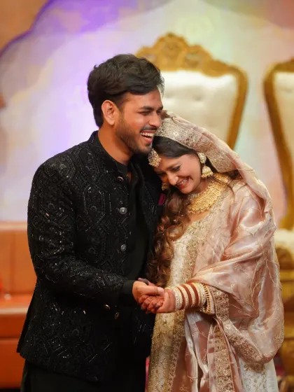 A tender and candid moment between the couple during their Nikaah ceremony. These quiet, emotional exchanges are just as important as the grand events.