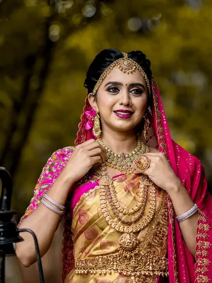 The warm tones of the antique gold jewellery look beautiful in the natural light, highlighting the craftsmanship of each piece.