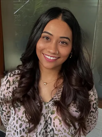 A rich mocha brown balayage for Prerna, perfect for adding depth to long hair.