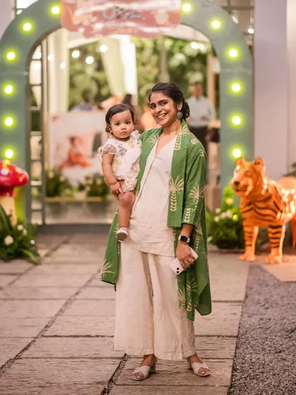 The birthday girl and her mom make their entrance. I love capturing these candid moments that show the joy and excitement of the day.