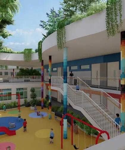 The design for Hyderabad Public School features five central courtyards that serve as hubs for student interaction. This render shows a vibrant play area, with colorful flooring and hanging gardens, creating a stimulating and joyful environment for young learners.