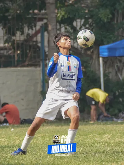 A player controls the ball with his chest, demonstrating the technical skills we emphasize from a young age. Our players are comfortable and confident on the ball.