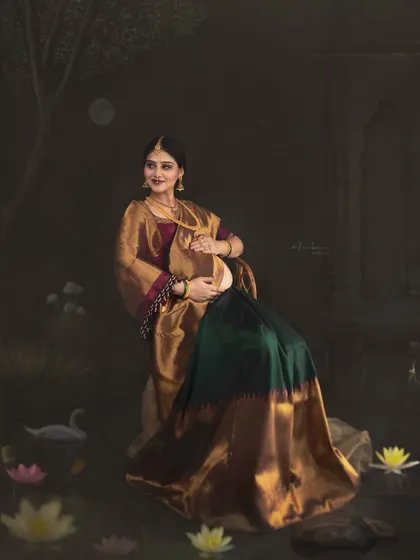 A full-view portrait set against a custom-painted backdrop of a moonlit pond. This frame shows my ability to create a complete, immersive world for your maternity story, blending art, culture, and photography.