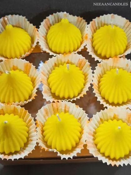 Our bright yellow Modak candles are perfect for bringing blessings and light into your home, especially during Ganesh Chaturthi. Each one is shaped like the traditional sweet offering, making it a beautiful addition to your puja or festive decor.