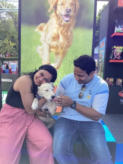 A heartwarming moment captured at our booth for Supercoat at PetFed Mumbai. Our setup is designed to accommodate everyone, including furry friends, making it a perfect addition to pet-friendly events.