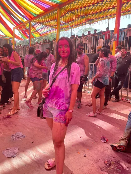 A fun, candid moment from the festival of colors. My happy-go-lucky vibe helps me connect with people and create a positive atmosphere at any event.