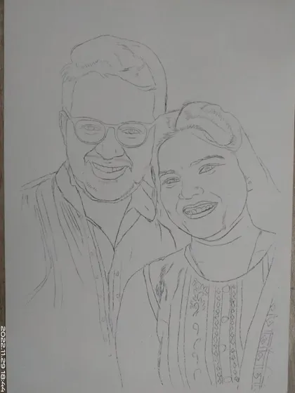 This is the initial outline stage for a couple's portrait. I use a grid to lightly sketch the placement of the features and outlines before committing to darker lines and shading.