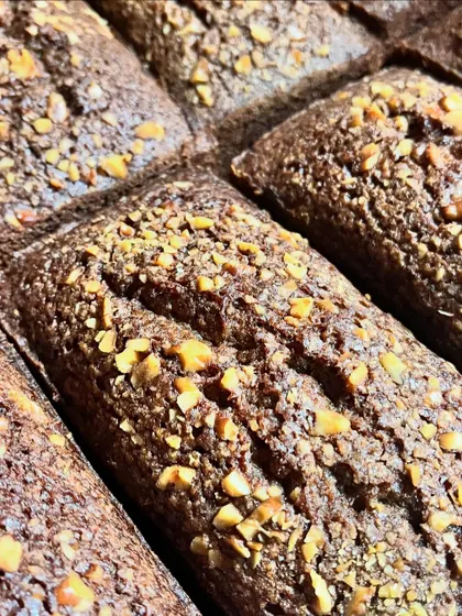 These are our small chocolate loaves, perfect for gifting or as a personal treat. They are dense, moist, and packed with flavour.