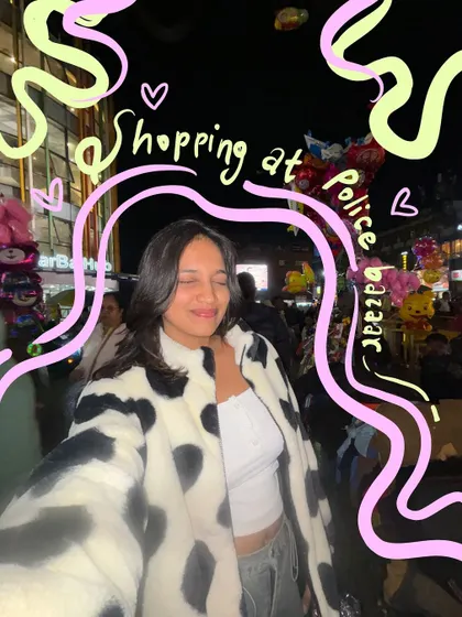 Shopping at Police Bazaar in Meghalaya, with fun doodles to capture the bustling, happy energy of the market at night.