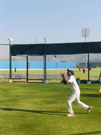 A player completes a clean catch during practice. These repetitive drills build muscle memory and confidence, making difficult catches seem routine during a real match.