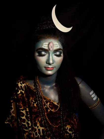 A full-body shot showcasing the complete Lord Shiva look, including the blue body paint, traditional attire, and Rudraksha beads. This demonstrates a complete character creation from head to toe.