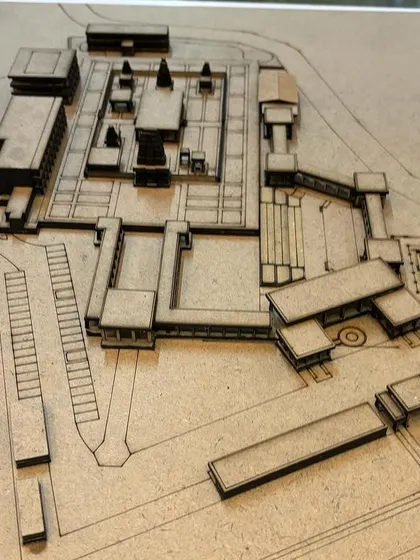 A physical laser-cut model used during the design phase to study the spatial relationships and scale of the Shiva Temple complex.