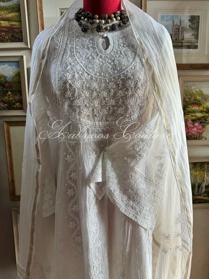 A full-length view of the Anarkali on a mannequin, demonstrating its graceful and timeless silhouette.