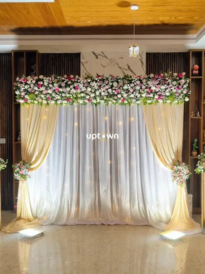 Another view of the home engagement backdrop with fairy lights.