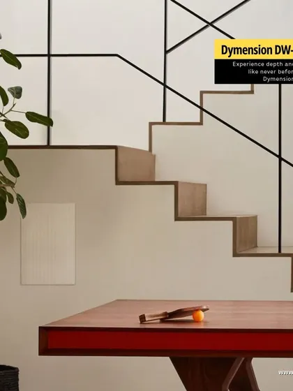 The Dymension DW-80 PRO in-wall speaker by Definitive Technology, shown here integrated into a modern stairwell wall. This demonstrates our ability to place high-performance sound in unconventional spaces without disrupting the architectural design.
