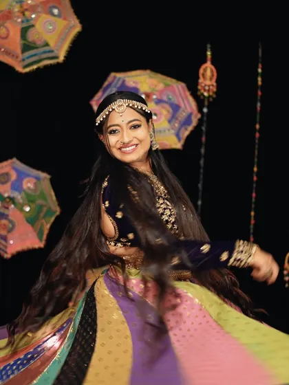 Another beautiful twirl from my Navratri shoot. The vibrant, multi-colored ghagra comes alive with every spin.