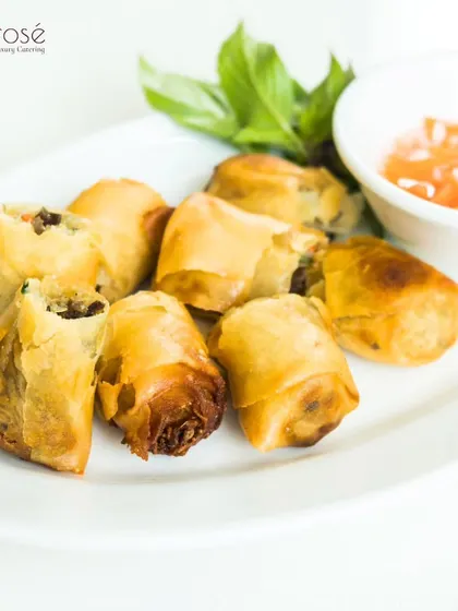 Crispy spring rolls served with a sweet chili dipping sauce. This classic Pan-Asian appetizer is always a hit and is prepared to perfection by our culinary team.