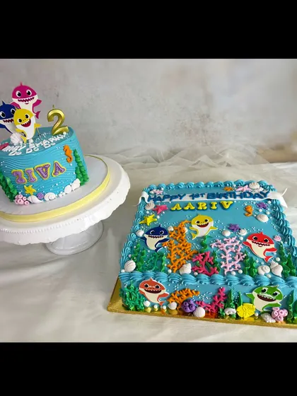 Two Baby Shark cakes that went out on the same day! It's always a popular choice for toddler birthdays.