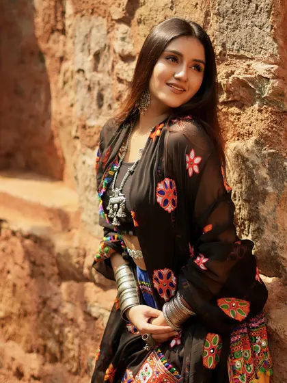 A beautiful, sun-lit shot in a traditional Gujarati lehenga, with a black embroidered dupatta. The look is inspired by the movie Ram-Leela.