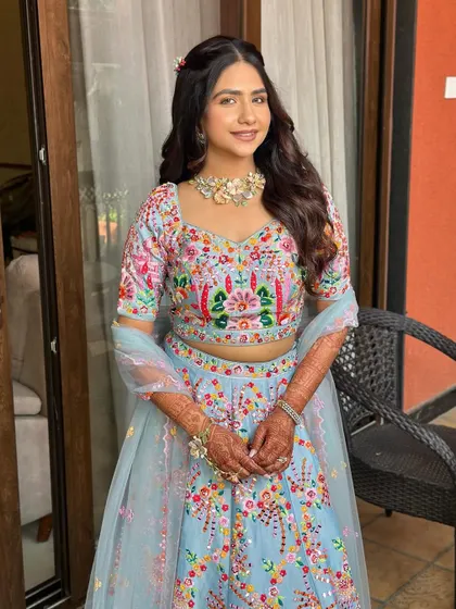 Another angle of this pastel princess. The makeup is fresh and light, letting her natural beauty and happy smile be the main focus.