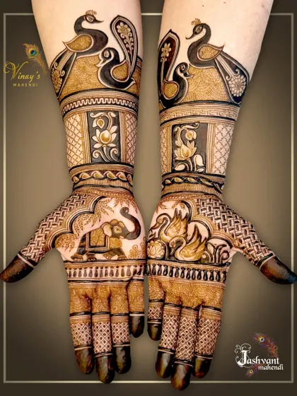 This series showcases a designer mehndi rich with fauna, including peacocks, swans, and elephants, blended with lotus flowers and traditional patterns for a full and festive look.