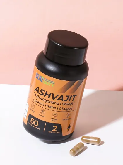 A dynamic shot of the supplement bottle, tilted on a white surface against a soft pink background. The angle and clean styling give it a modern and stylish look.