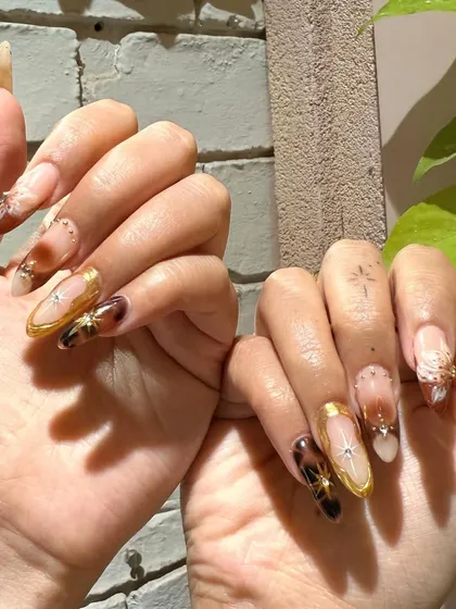 A rich and luxurious set featuring tortoise shell patterns, gold accents, and celestial details. All hand-painted for a flawless finish.