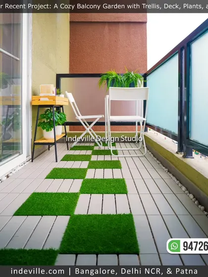 A clean and simple balcony setup. The checkerboard flooring, minimalist white seating, and a small wooden plant stand make this a perfect, uncluttered spot for enjoying the city view.