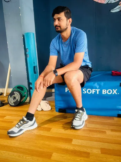 Taking a well-deserved rest between sets. Our functional area includes equipment like plyo soft boxes, perfect for both high-intensity workouts and a place to catch your breath.