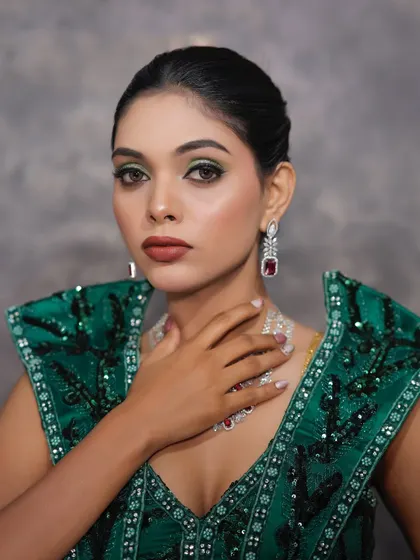 The model posing to show off the complete look.