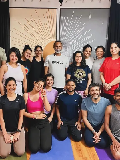 Our amazing community feeling the love and energy after a rejuvenating yoga session with Srinatha Sir. Together, we stretch, breathe, and grow.