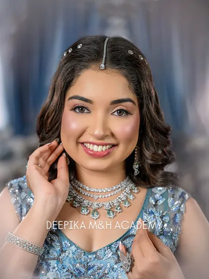 A close-up portrait of the model with a big, beautiful smile. This photo captures the joy and confidence that comes with feeling beautiful.