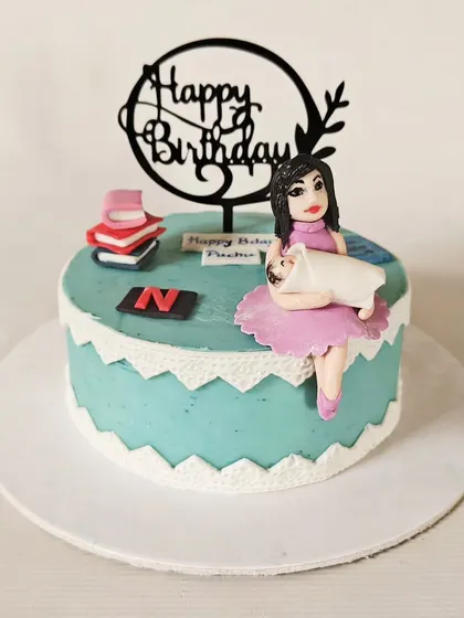 A birthday cake for a new mom, celebrating all the things she loves. This design includes a fondant figurine of her with her baby, along with nods to Netflix and books.