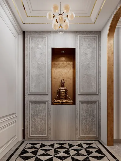 The hidden closet doors closed, appearing as a sophisticated paneled wall with a central niche for a Buddha statue. This is a prime example of how we integrate functionality and aesthetics.
