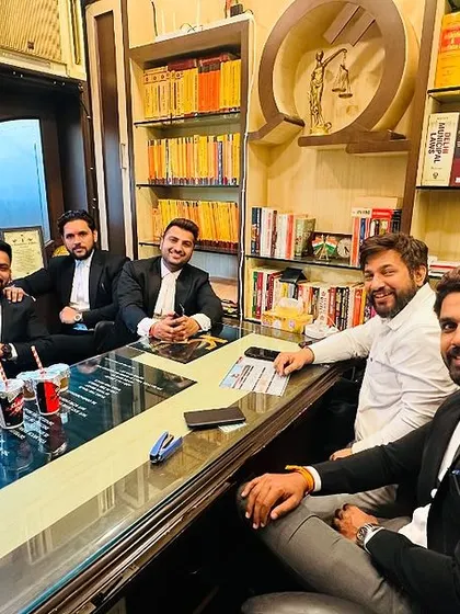 A strategy session with my team. I believe in a collaborative approach; having more brains on your side is a significant advantage when tackling complicated legal challenges for our clients.