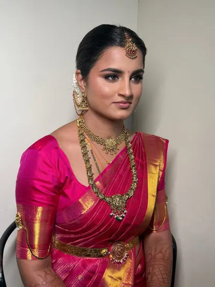 Janaki on her reception night. We went for a subtle glow look with nude tones to bring out her inner radiance.