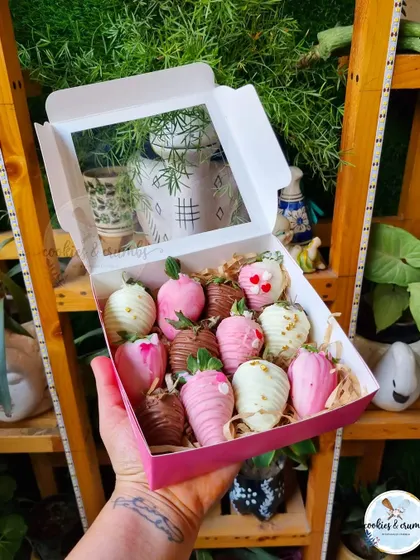 A pretty pink and white assortment of my chocolate-dipped strawberries. These are decorated with different drizzles and heart-shaped sprinkles.