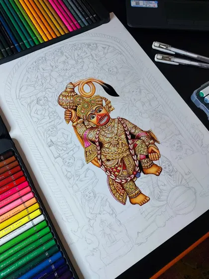 The early stages of the Shree Kashtbhanjan Dev Hanuman ji sketch. The golden ornaments are starting to take shape with careful layering of yellow and brown pencils.