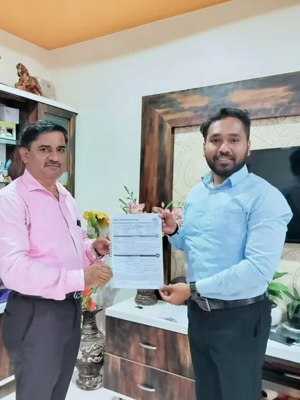 Our team hands over a solar agreement to a new customer.