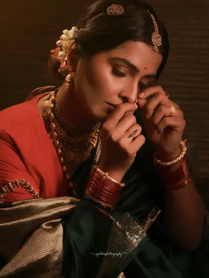 A series of moody and soulful portraits with a vintage feel. The model is styled in a handwoven saree and antique jewelry, with soft, diffused lighting creating a timeless and elegant atmosphere.