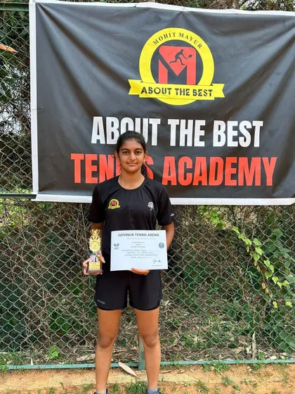 A final shot of Yahana with her trophy, showcasing the promising talent in our academy.