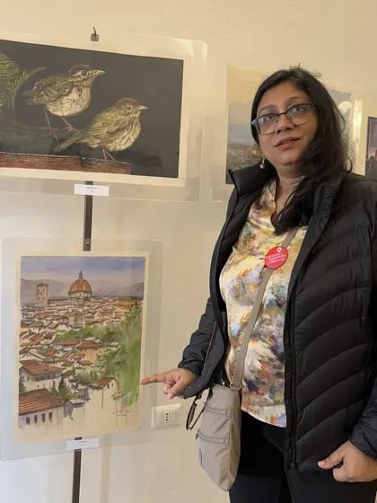 Another photo of my friend Shikha pointing to my work at the Fabriano festival. It's wonderful to have friends support you from across the world.