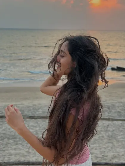 A candid laugh on the beach as the sun goes down. These are the unposed, happy moments that make group travel so special.