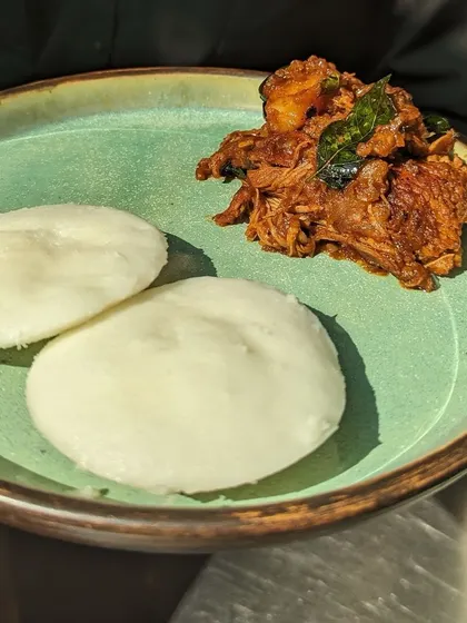 Vatteyappam is a steamed rice and coconut cake that is traditionally made as a round cake. I make mine in an idli mould for convenience, and it pairs wonderfully with my melt-in-your-mouth Kerala Chicken Roast.