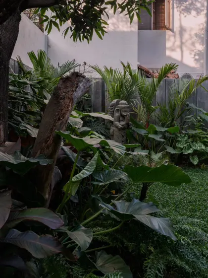 A glimpse of the garden at Pràna, a tranquil oasis in the middle of Bangalore. The landscaping was as important as the interior design in creating the home's overall feel.