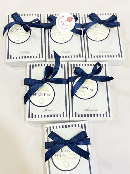 "To-dos before the I-dos." These personalized notepads are a fun and practical item to include in a groomsmen hamper.