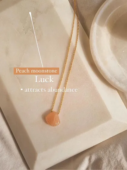 My beach shell collection also includes this Peach Moonstone shell pendant, a stone for luck and abundance.